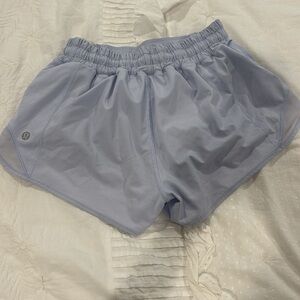 LULULEMON hotty hot mid rise shorts in purple/blue